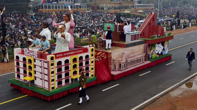 The tableau of capital city Delhi passes through the 68th Republic Day Parade at Rajpath in New Delhi. (Photo: PTI)