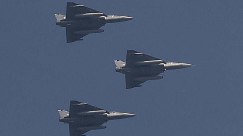 Indian Air Forces Tejas planes flying past for the first time during a full dress rehearsal for the Republic Day Parade at Rajpath in New Delhi. (Photo: PTI)