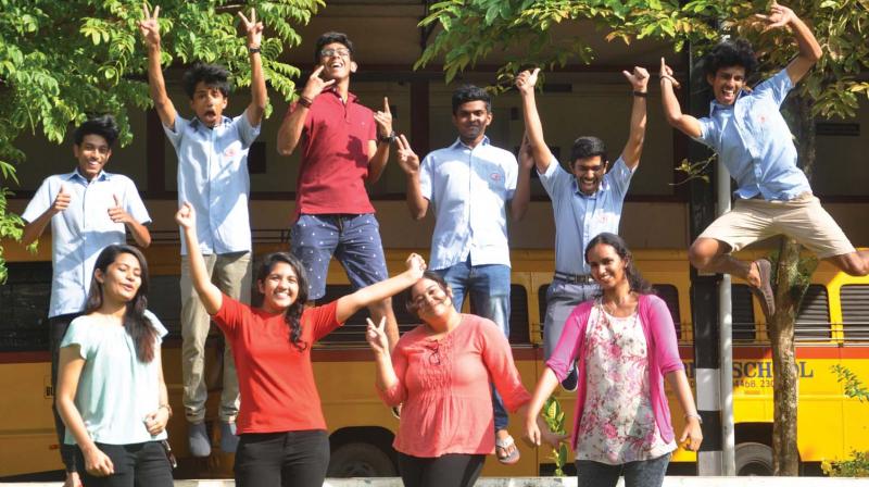 Class XII students of Toc H Public School celebrate their success after their results were declared, in Kochi on Saturday. (Photo: SUNOJ NINAN MATHEW.)