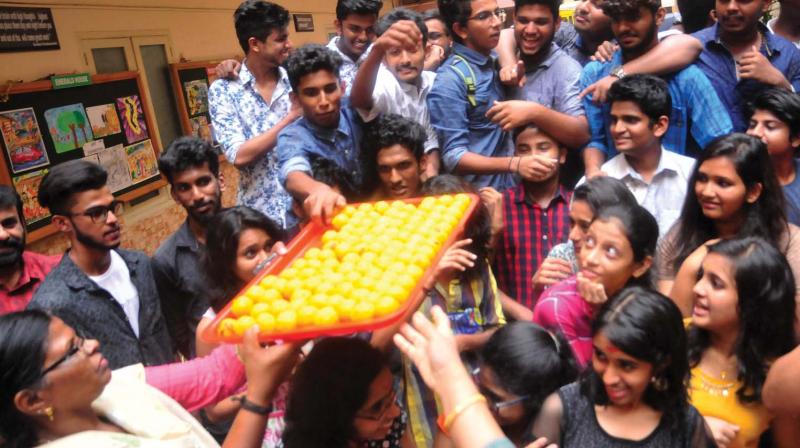 The students of Saraswathi Vidyalaya ,Vattiyoorkavu, celebrate  after CBSE class XII  results were announced on Saturday     (Photo: A.V. Muzafar)