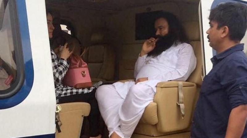 Both sentences will run consecutively for a total of 20 years in jail for the flamboyant guru who has millions of followers. (Photo: PTI)