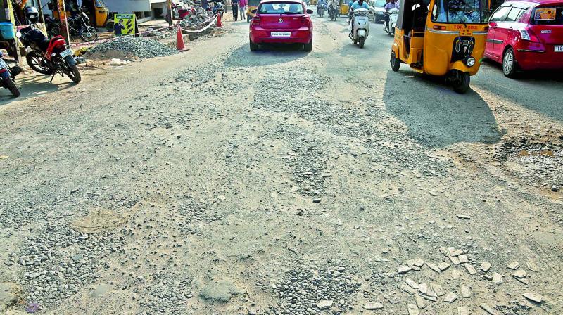 A damaged road at West Marredpally causing inconvenience to motorists. (Photo: DC)
