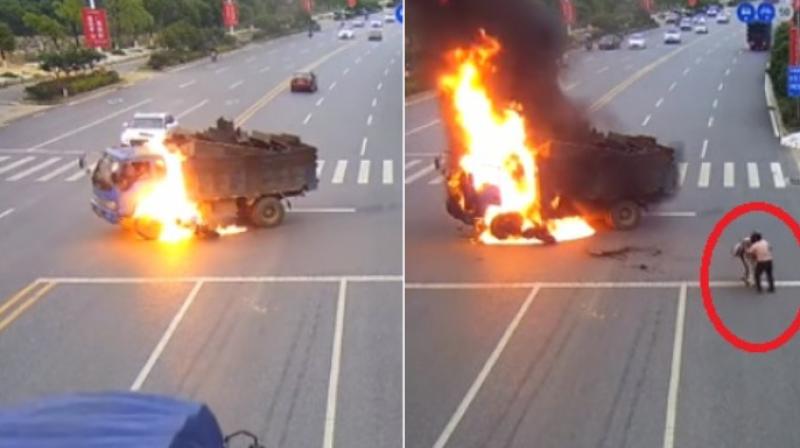 The bike immediately caught fire and so did the part of the truck and in no time the biker was on fire.