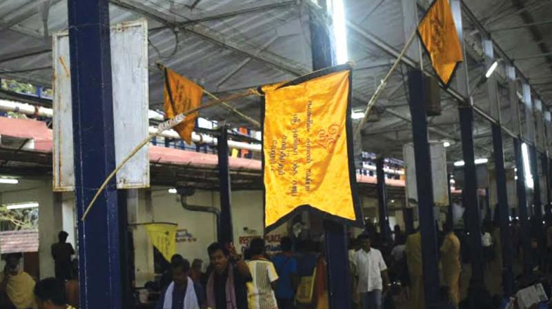 Myriad flags of devotees groups are hoisted at Nadapandal in Sannidhanam (Photo: VIPIN KUMAR)
