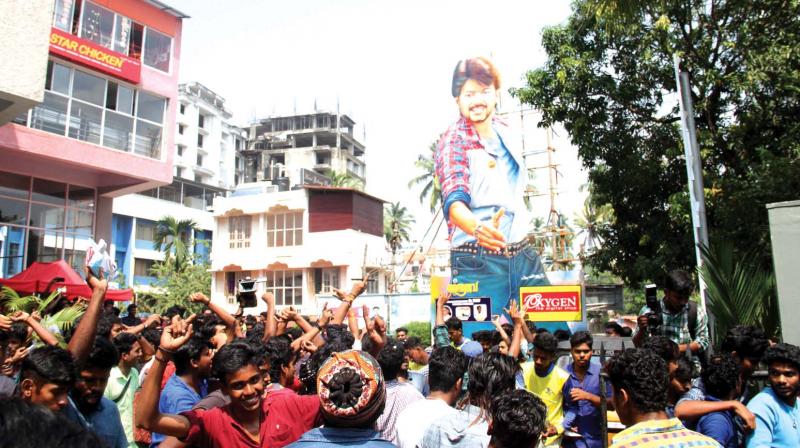 Tamil super star Vijays fans celebrate the release of his new Tamil film Bhairava at Kairali Sree theatre in Thiruvananthapuram on Thursday. (Photo: DC)