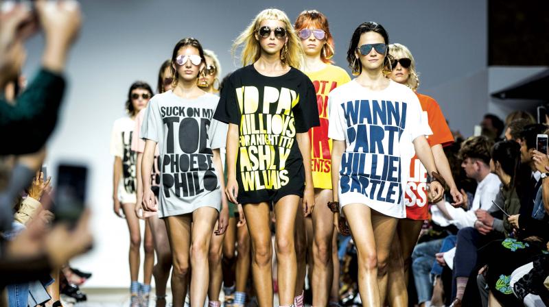 Henry Hollands bold,  fashion groupie slogan tees made quite the splash at the London Fashion Week