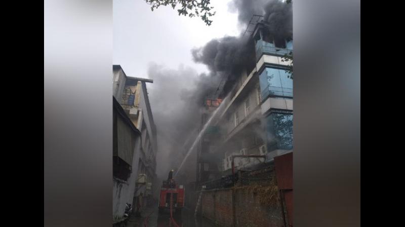 The fire that broke out in a paper card factory in Delhis Naraina area on Thursday. (Photo: ANI)