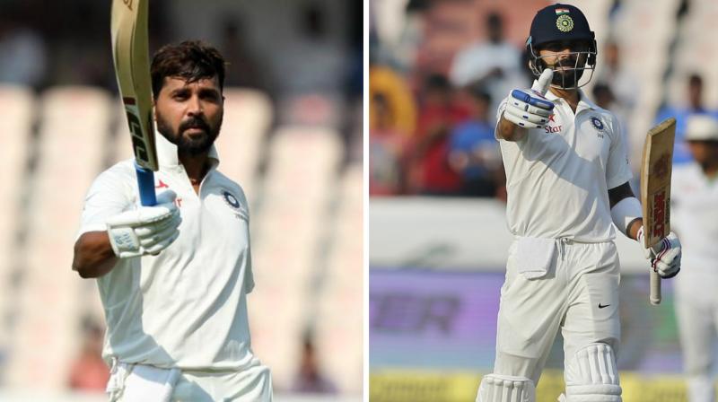 Murali Vijay (108) and Virat Kohli (111 not out) punished Bangladesh as India amassed 356 runs on day one of the one-off Test. (Photo: BCCI / AP)