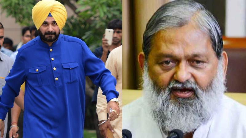 Haryana Health Minister Anil Vij termed Navjot Sidhus participation in the Imran Khans oath-taking ceremony as an \act of disloyalty\ towards India which \will not be endorsed by any patriotic citizen\ of the country. (Photo: AFP / PTI)
