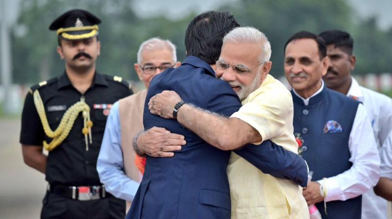 Japan PM Shinzo Abe in India, Modi welcomes him with bear hug