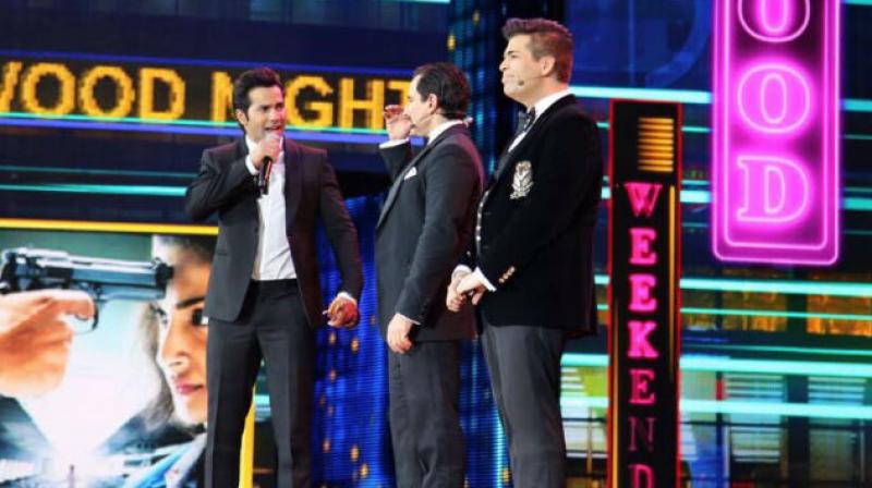 Varun Dhawan, Saif Ali Khan and Karan Johar while they crack jokes on nepotism. (Photo: Twitter/IIFA)