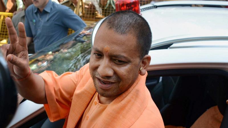 Uttar Pradesh Chief Minister Yogi Adityanath leaves after a meeting in Lucknow. (Photo: PTI)