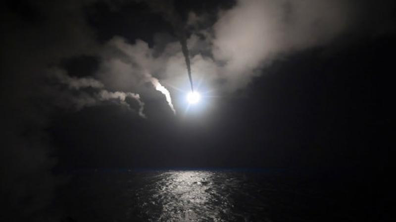 n this file image provided on Friday, April 7, 2017 by the U.S. Navy, the guided-missile destroyer USS Porter (DDG 78) launches a tomahawk land attack missile in the Mediterranean Sea. (Photo: AP)