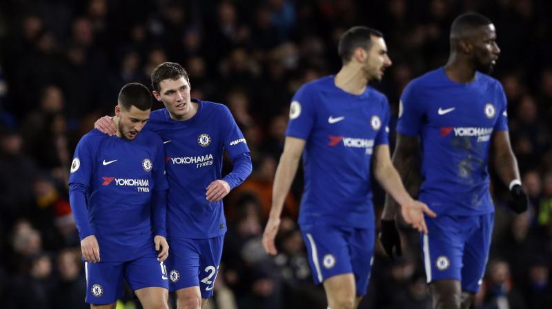 Eden Hazards (extreme left) two goals helped Chelsea climb into fourth with the gap between Manchester United in second and fifth-placed Tottenham Hotspur now just four points. (Photo: AP)