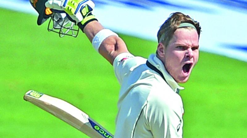 Steven Smith is ecstatic after reaching his century. (Photo: PTI)