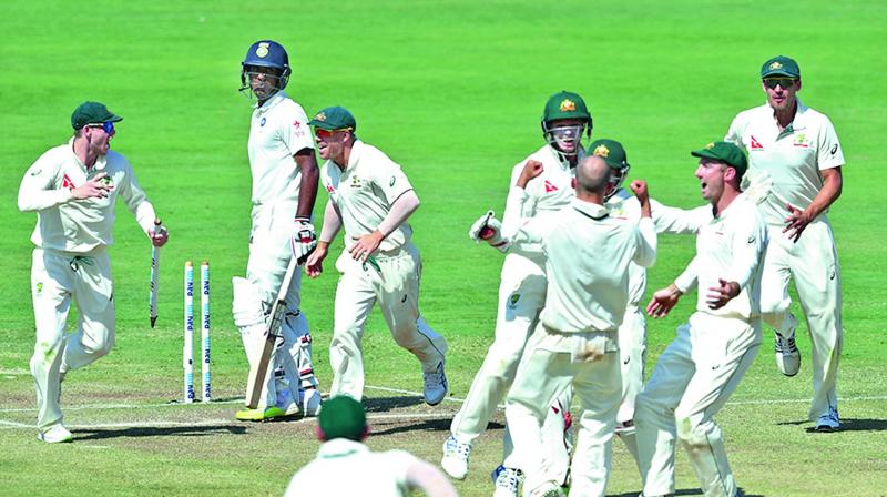 Australian players are jubilant after winning the first Test in Pune by 333 runs. (Photo: PTI)