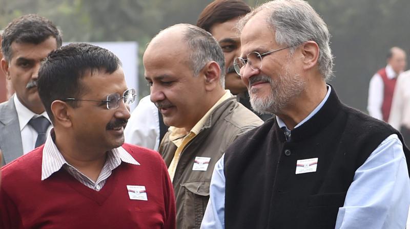 Delhi Lt Governor Najeeb Jung is seen with Chief Minister Arvind Kejriwal in New Delhi. (Photo: PTI/File)