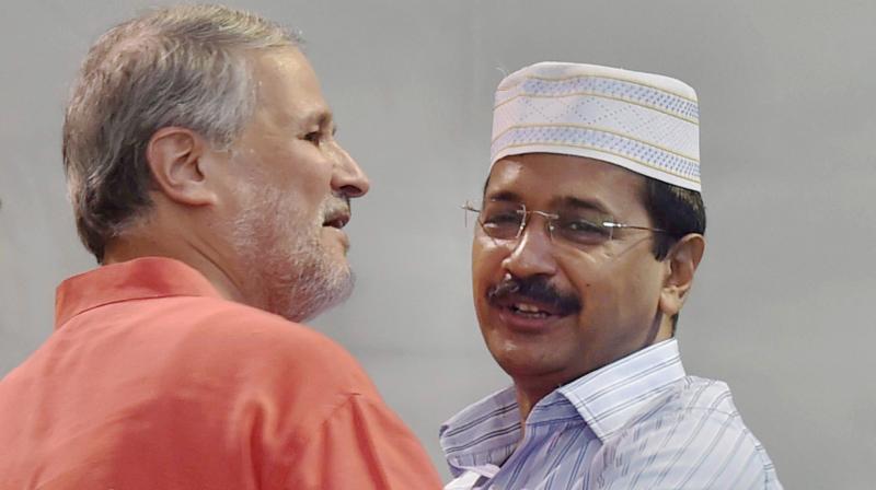 In this file picture Delhi Lt Governor Najeeb Jung is seen with Chief Minister Arvind Kejriwal at an Iftar party in New Delhi. (Photo: PTI)