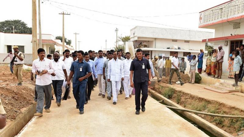 Telangana Chief Minister K Chandrasekhar Rao inspecting the newly-constructed 2BHK houses by the state government at a cost of Rs 5.5 lakh per dwelling. (Photo: Facebook)