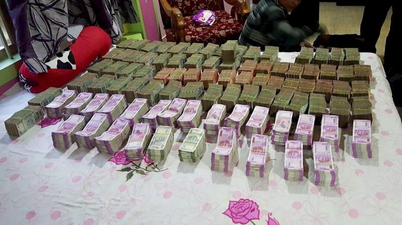 The money was in the old Rs 500 and Rs 1,000 currency notes. (Photo: PTI)