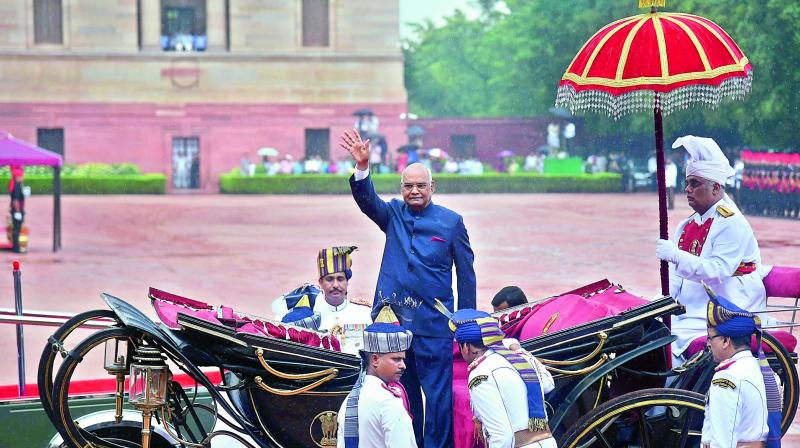 Newly sworn-in President Ram Nath Kovind leaves in a regal buggy after inspecting a guard of honour in the forecourt of the Rashtrapati Bhavan on Tuesday. (Photo: PTI)