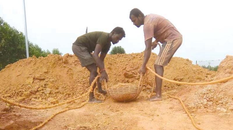 The Manuvaddars have given up their traditional job of well digging and are helping households install rain water harvesting systems (Photo: DC)
