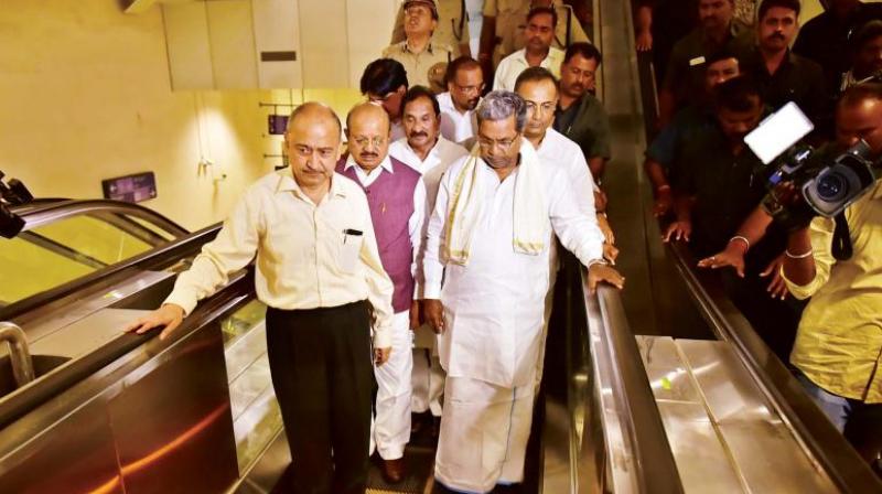 Chief Minister Siddaramaiah inspecting Phase I of Namma Metro in Bengaluru on Thursday. (Photo: DC)