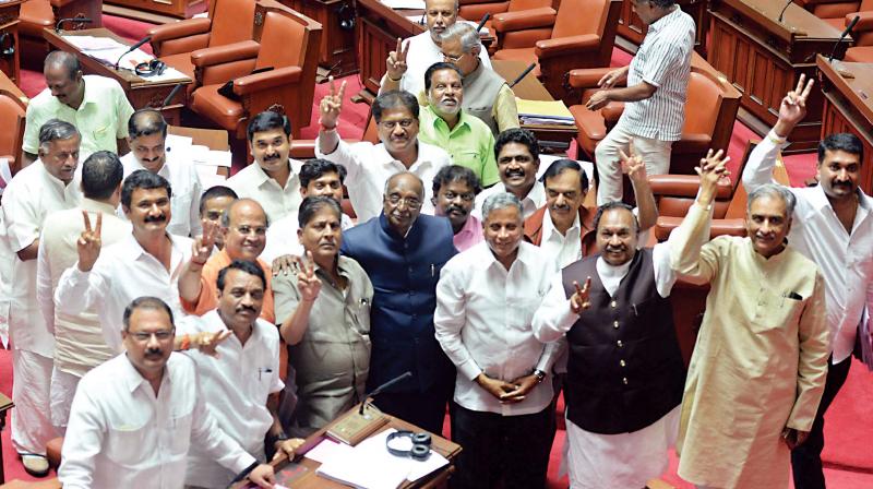 BJP and JD(S) MLCs after defeating the Congress no-confidence motion against legislative Council Chairman D.H. Shankaramurthy (Photo: DC)