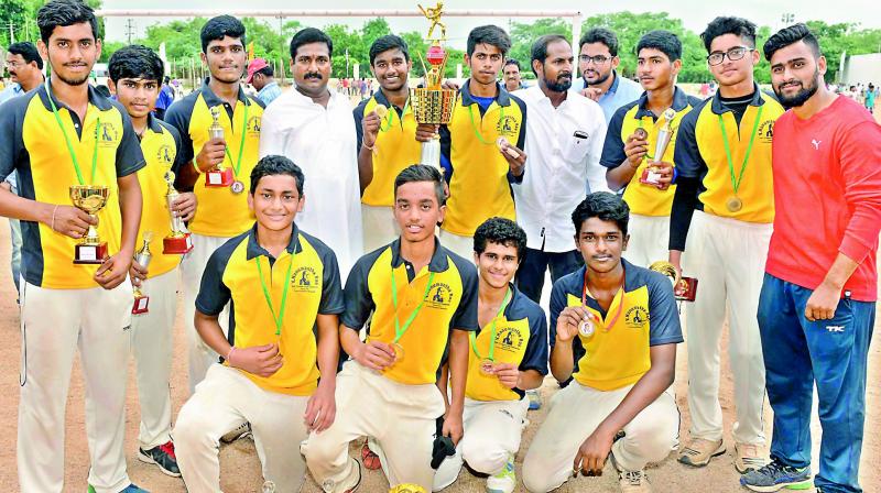 HMV Cricket Academy (HMV Commandos) players are all smiles as they pose after emerging champions by beating Global Stars in the final of the VHR Under 16 League Cricket Championship held in Hyderabad.