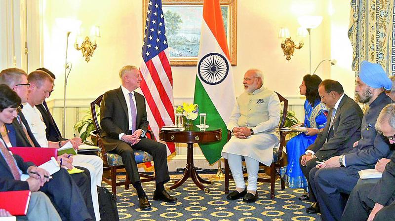 Prime Minister Narendra Modi talks with US secretary of defence Jim Mattis in Washington DC USA on Monday. (Photo: PTI)