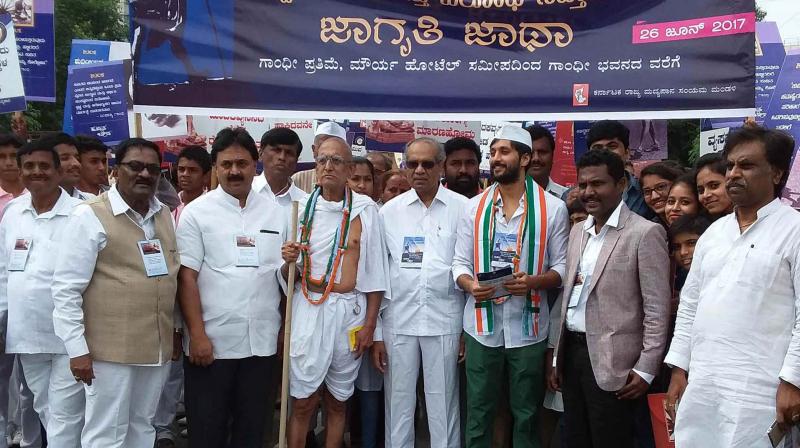 President, Gandhi Smaraka Nidhi, Dr Woode P. Krishna, and others participate in World Anti-Drug Week, organised by the Karnataka State Temperance Board at Gandhi Bhavan in Bengaluru on Monday			KPNPresident, Gandhi Smaraka Nidhi, Dr Woode P. Krishna, and others participate in World Anti-Drug Week, organised by the Karnataka State Temperance Board at Gandhi Bhavan in Bengaluru on Monday			KPNPresident, Gandhi Smaraka Nidhi, Dr Woode P. Krishna, and others participate in World Anti-Drug Week, organised by the Karnataka State Temperance Board at Gandhi Bhavan in Bengaluru on Monday (Photo: KPN)