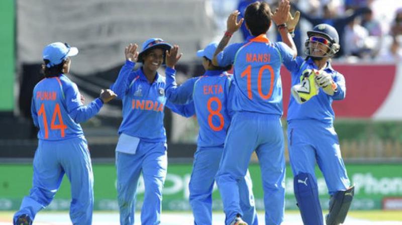 Indian cricketers celebrate the fall of the last wicket Pakistan captain Sana Mir during the ICC Womens World Cup 2017 match between India and Pakistan at County Ground in Derby, England. (Photo: AP)