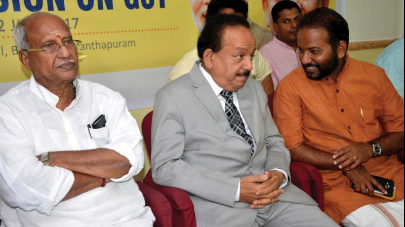 O Rajagopal, MLA, Union Environment Minister Dr Harsh Vardhan, and BJP district president S. Suresh during a discussion on GST in Thiruvananthapuram on Sunday. (Photo: PEETHAMBARAN PAYYERI)