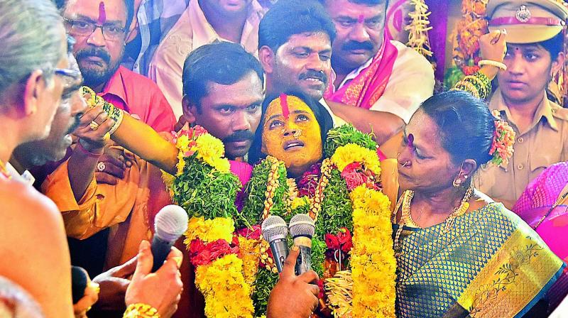 Swarna Latha, who performs as an oracle at the annual fete Rangam during the concluding ceremony of the two-day Bonalu festival held at the Ujjaini Mahakali temple, in Secunderabad on Monday.