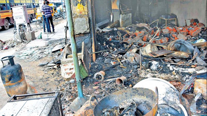 he mangled remains, of an ATM, hours after the gas cylinder exploded on Saturday night.