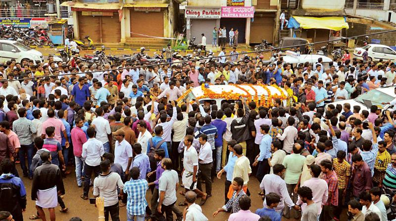 The mortal remains of RSS activist Sharath Madivala being carried in a procession at BC Road near Mangaluru recently