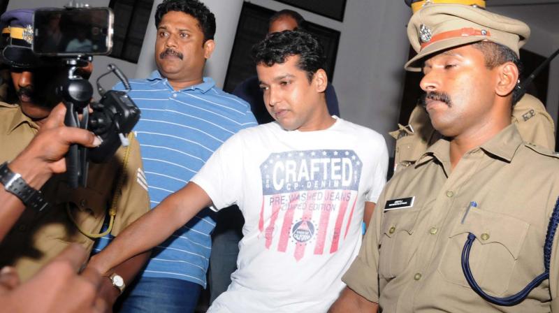 Pulsar Suni being produced before the Ernakulam chief judicial magistrate court on Wednesday in connection with a 2011 abduction attempt case involving a senior actress    (Photo: Arun Chandrabose)