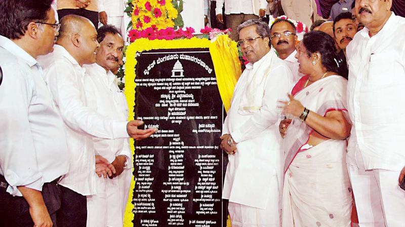 Chief Minister Siddaramaiah, Minister K.J. George and Mayor G Padmavathi inaugurate various development projects at BTM Layout in Bengaluru on Monday  (Photo:  KPN)