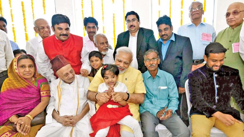 Prime Minister Narendra Modi with  APJ Abdul Kalams family in Rameswaram 	(Photo: PTI)