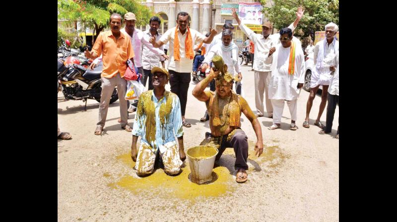 BJP workers protest for release of water in Mandya on Monday