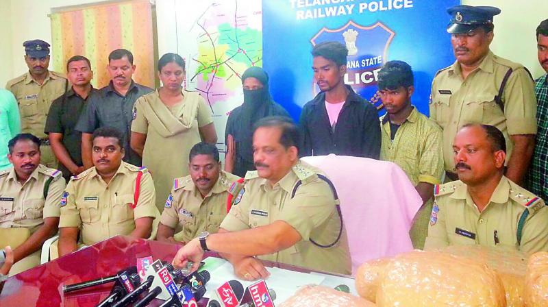 Railway police in-charge SP S. Rajendra Prasad speaking to the media after arresting the ganja smugglers  (Photo: DC)