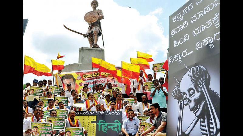 Members of Karnataka Rakshana Vedike stage a protest against the use of Hindi signboards in the Namma Metro (Photo: KPN)