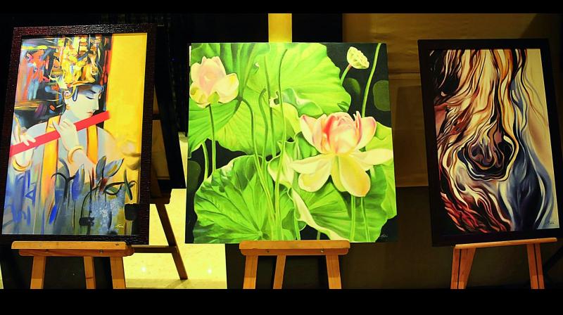 Some of the artworks on display by artist Hari at the charity art exhibition
