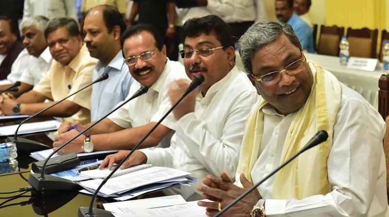 Chief Minister Siddaramaiah, Water Resources Minister M.B. Patil and Union Minister D.V. Sadananda Gowda at an all-party meet on Kalasa-Banduri Nala project in Bengaluru on Monday (Photo: DC)