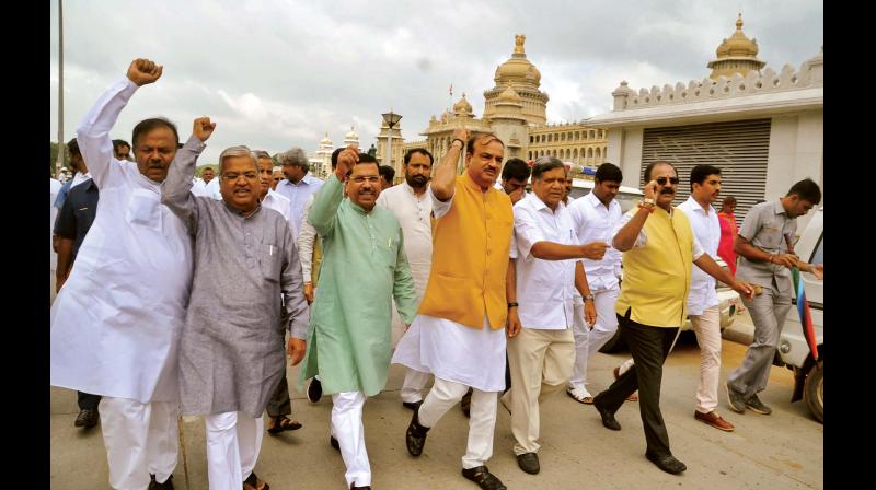 BJP leaders H.N. Ananth Kumar, Jagadish Shetter, and Prahlad Joshi lead Raj Bhavan Chalo rally against the Congress government, in Bengaluru on Monday 	(Photo: DC)