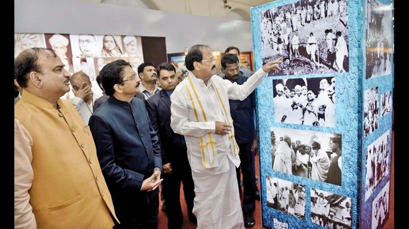 Vice President M. Venkaiah Naidu goes around the exhibits after inaugurating an exhibition  New India resolve to achieve  to mark the platinum jubilee of the Quit India movement at Anna University, Chennai on Sunday. Union Chemicals and Fertilisers Minister Ananth Kumar and Governor Ch. Vidyasagar Rao are also seen. (Photo: DC)