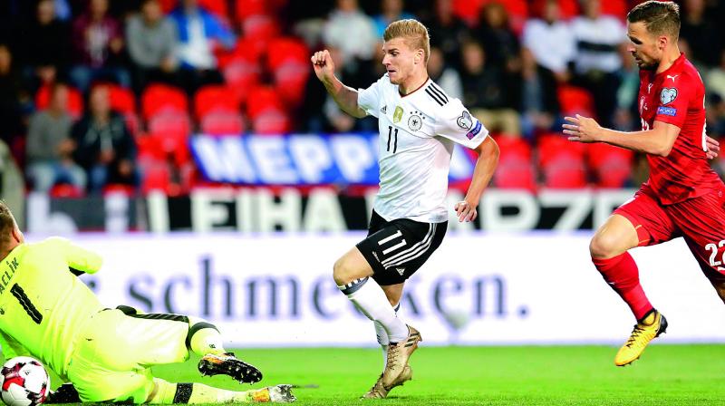 Germanys Timo Werner scores against Czech Republic in their World Cup qualifying match on Friday. (Photo : AP)