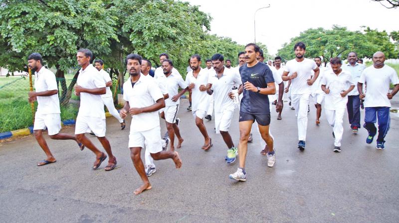 Prisioners in Puzhal along with Tamil Nadu prisons director C. Sylendra Babu  participate in the mini marathon (Photo: DC)