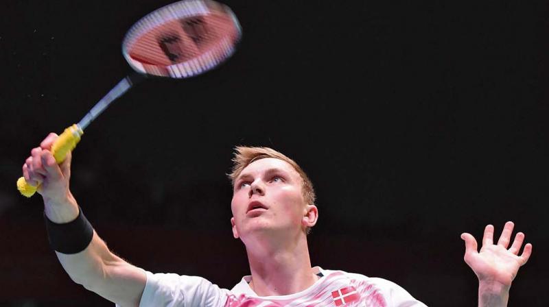 Denmarks Viktor Axelsen returns to Lee Chong Wei of Malaysia in their Japan Open final on Sunday (Photo: AFP)