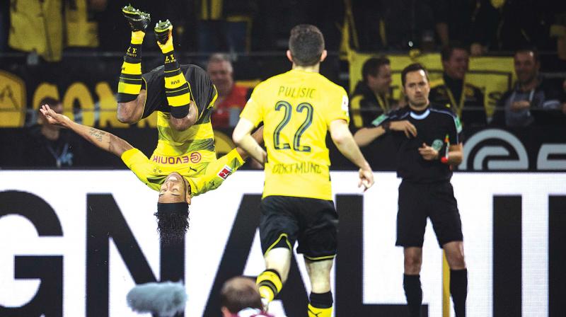 Borussia Dortmunds Pierre-Emerick Aubameyang (background left) celebrates scoring a goal on Saturday (Photo: AFP)